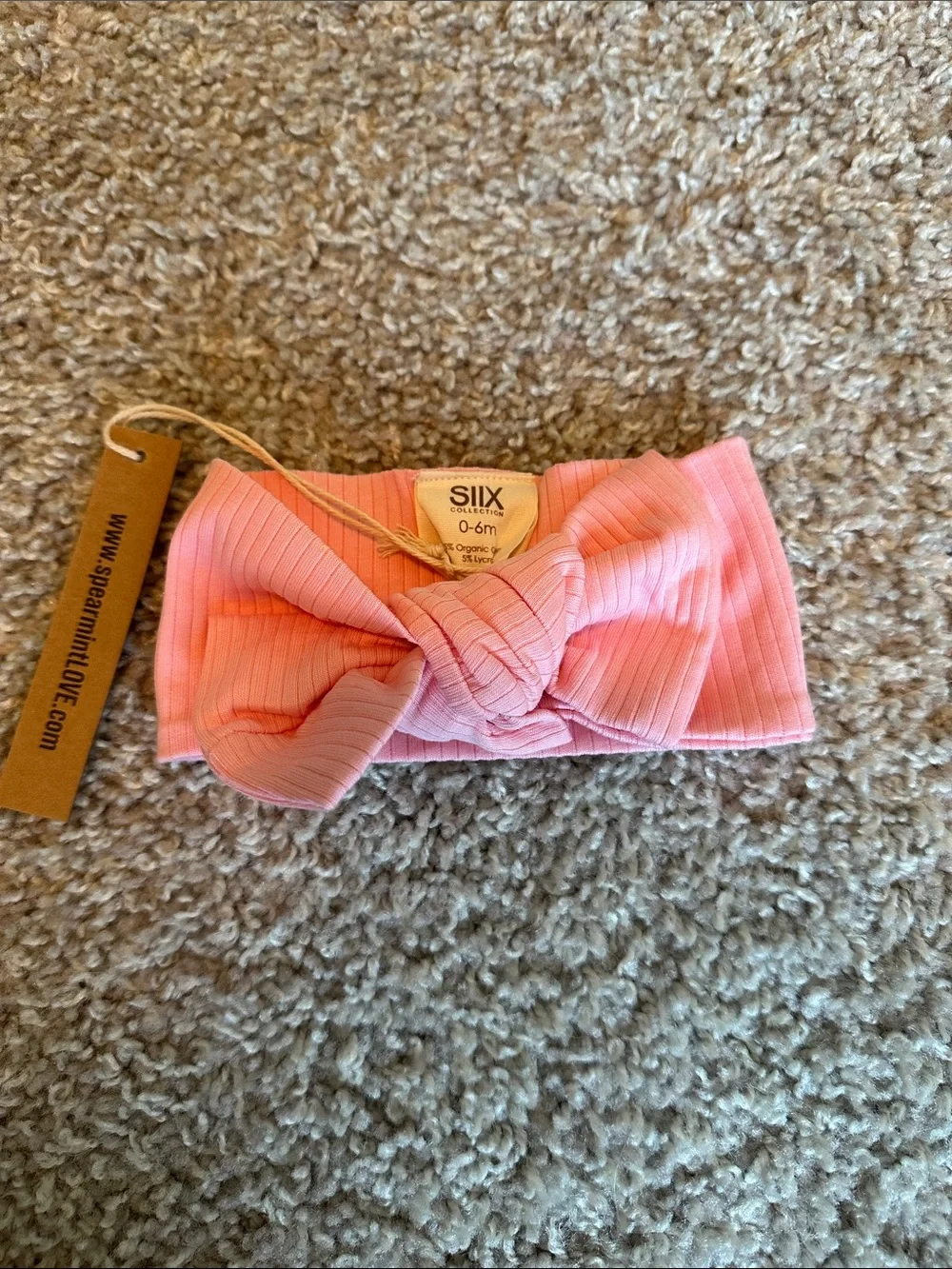Pink organic ribbed frill zip footie with matching headband